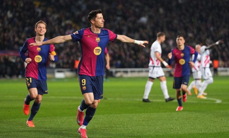 Barca beats Rayo Vallecano to go top of La Liga