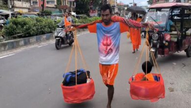 Pilgrimage Walk: Father Carries Children to Jalpesh Temple on