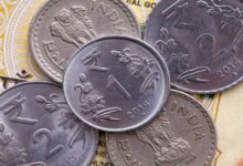 indian-rupee-hits-record-low-against-us-dollar-90-16