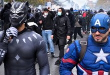 france-protests-superheroes-paris-demonstrations