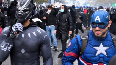 france-protests-superheroes-paris-demonstrations